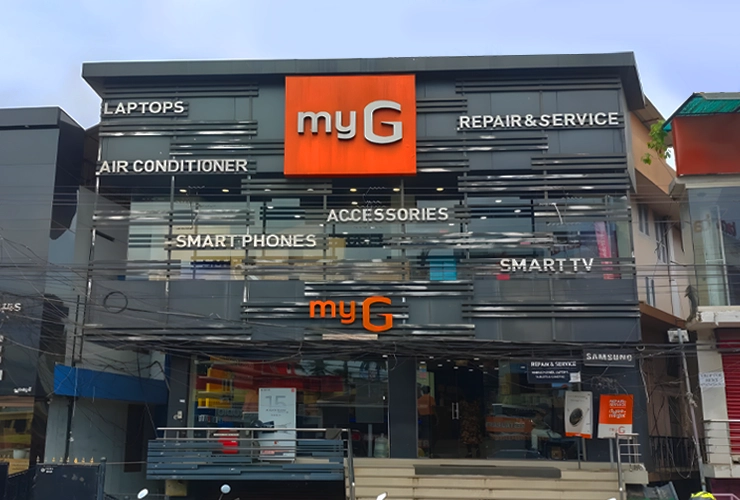 myG Digital Hub showroom in the Soudha Manzil Building, Pattom, Thiruvananthapuram, featuring promin