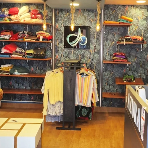 Azura fashion hub thycaud trivandrum wedding couture for bride and groom designer outfits