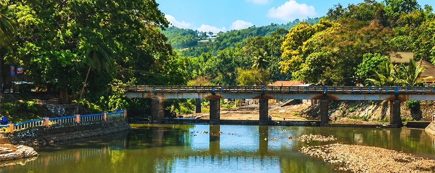 Aruvikkara Dam reservoir surrounded by lush greenery in Trivandrum