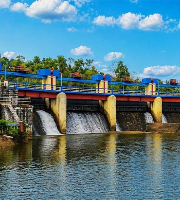 Aruvikkara Dam reservoir surrounded by lush greenery in Trivandrum